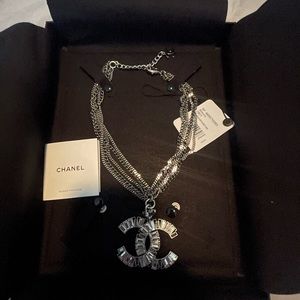 CHANEL chunky crystal C necklace.